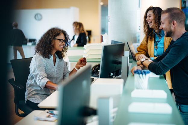 People interacting in an office.